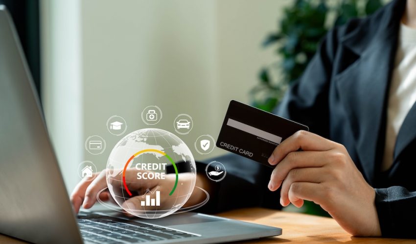 Credit,Score,Concept,,Businesswoman,Using,Laptop,With,Credit,Score,For Credit score concept, Businesswoman using laptop with credit score for student loan, mortgage and payment cards.